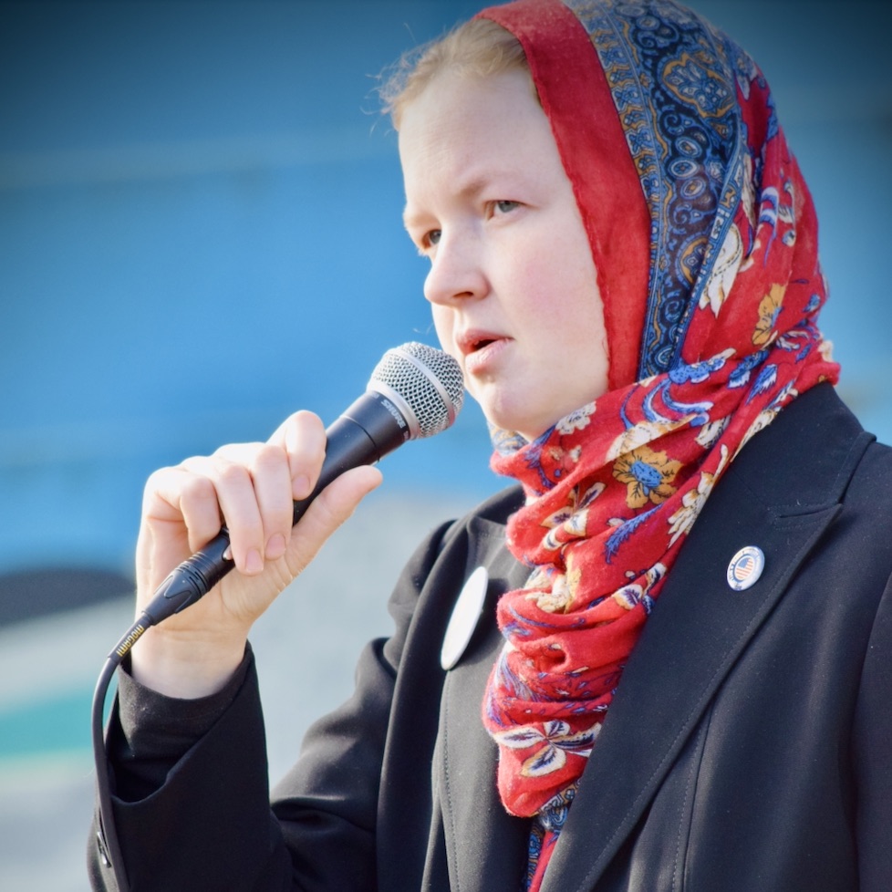 Melissa Chaudhry speaking at the Armistice Day rally