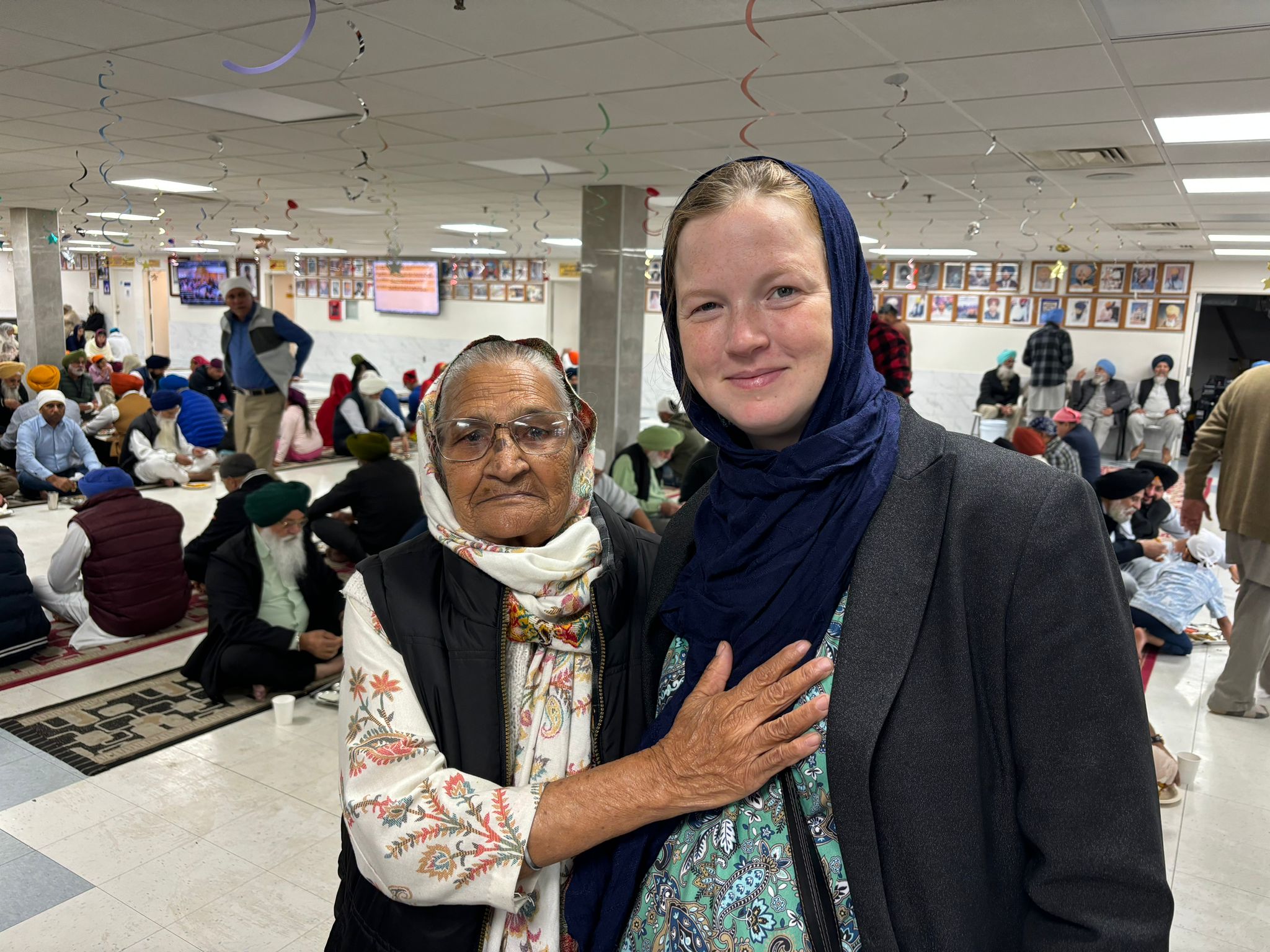 With an elder at the Gurdwara
