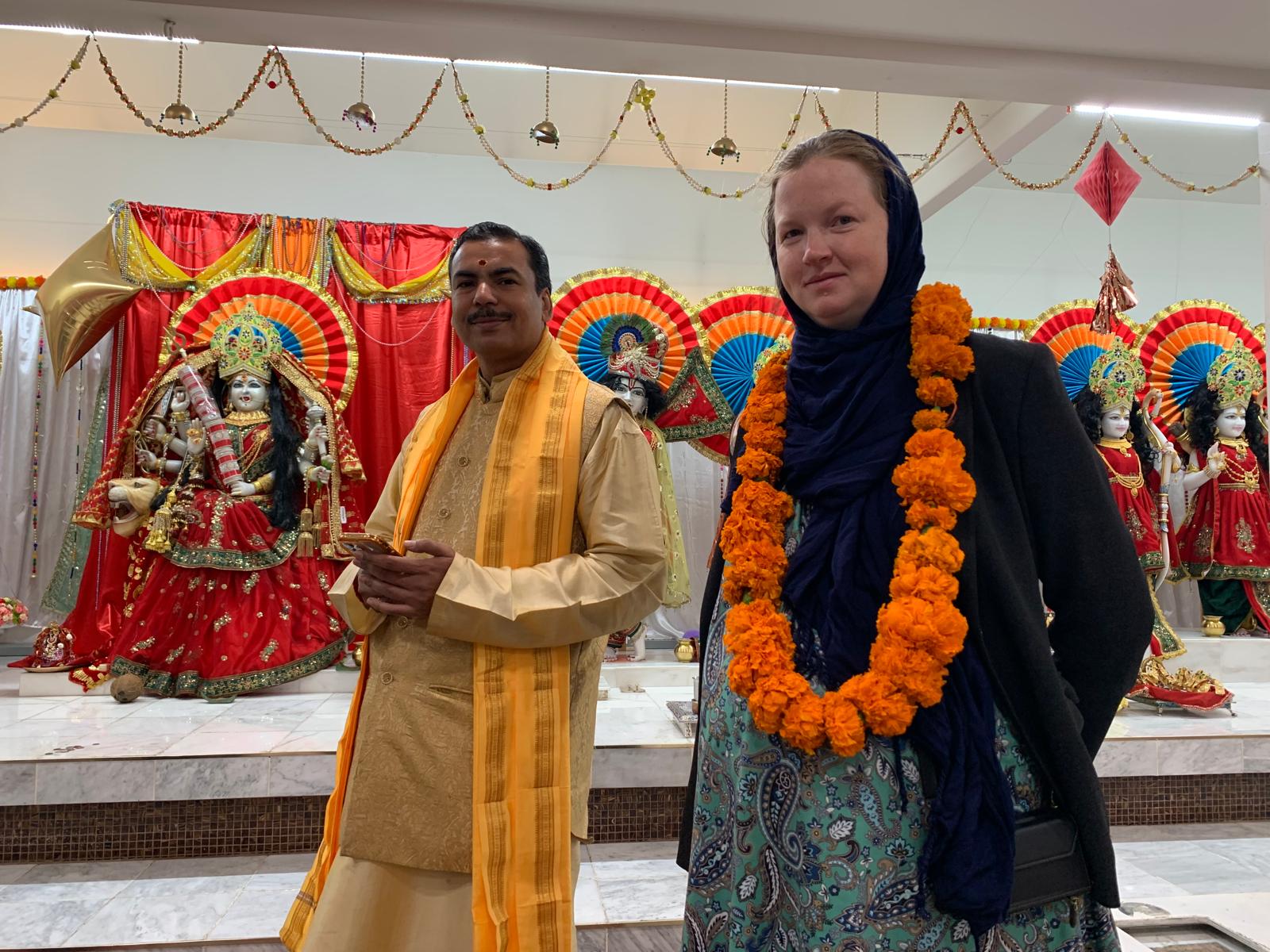 Welcomed at a Hindu temple with marigold garland